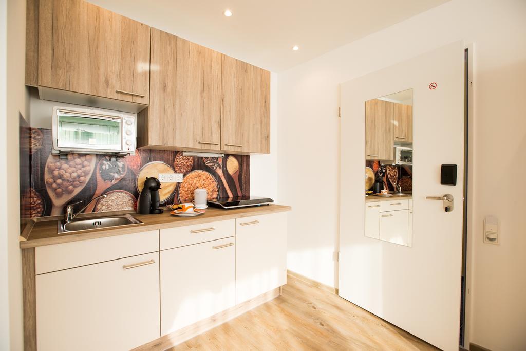 Design Sleepy Cologne Aparthotel Bilik gambar