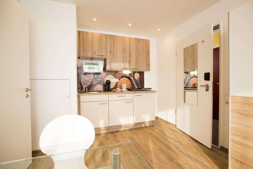 Design Sleepy Cologne Aparthotel Bilik gambar