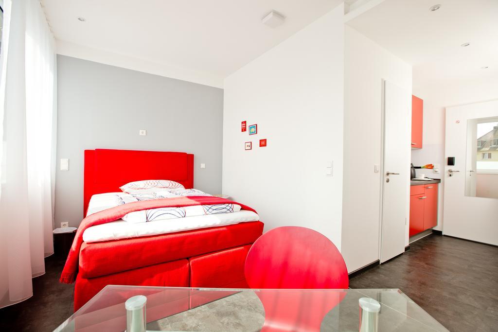 Design Sleepy Cologne Aparthotel Bilik gambar