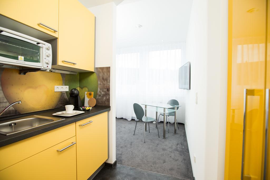 Design Sleepy Cologne Aparthotel Bilik gambar