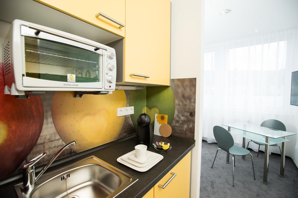 Design Sleepy Cologne Aparthotel Bilik gambar