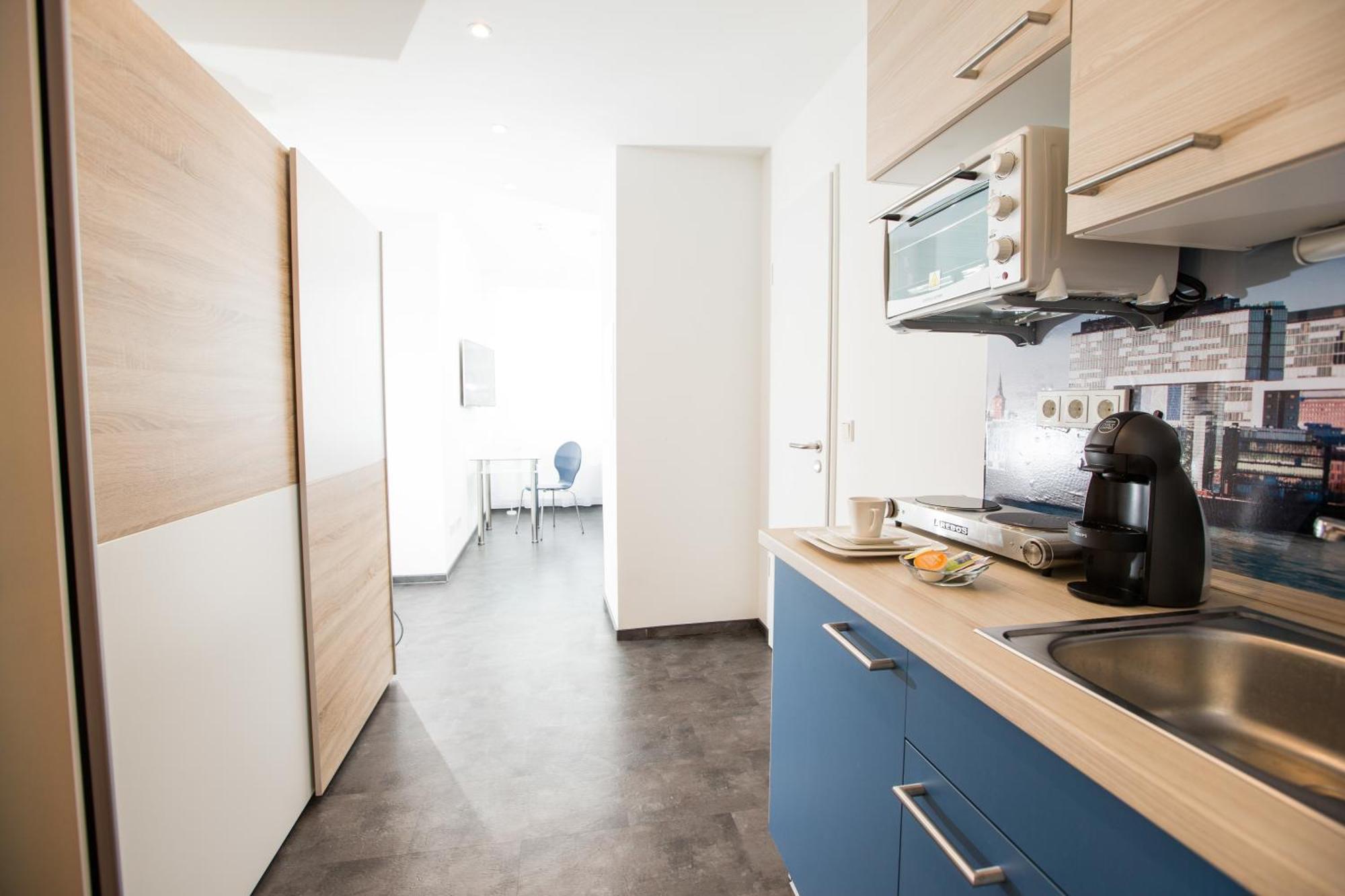 Design Sleepy Cologne Aparthotel Bilik gambar